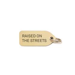 Raised on the streets Dog Charm - Gold